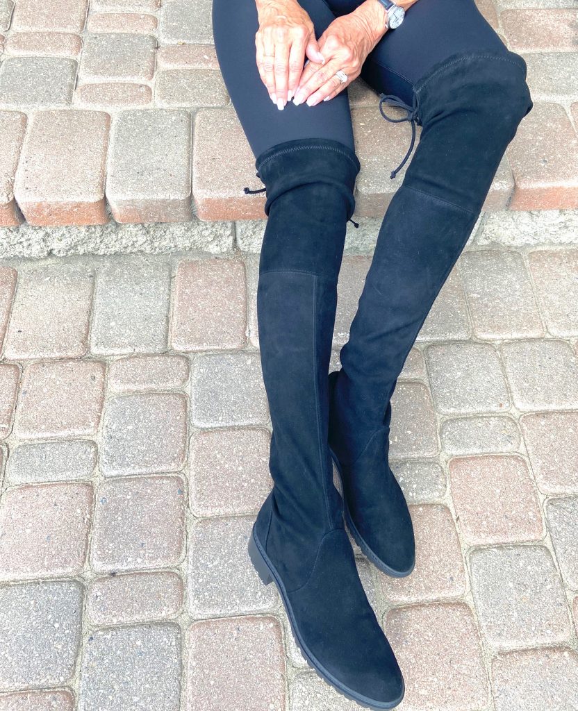 photo of black over the knee boots