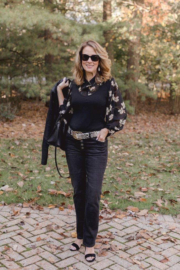 photo of val in jeans, blouse, tank, belt and sandals