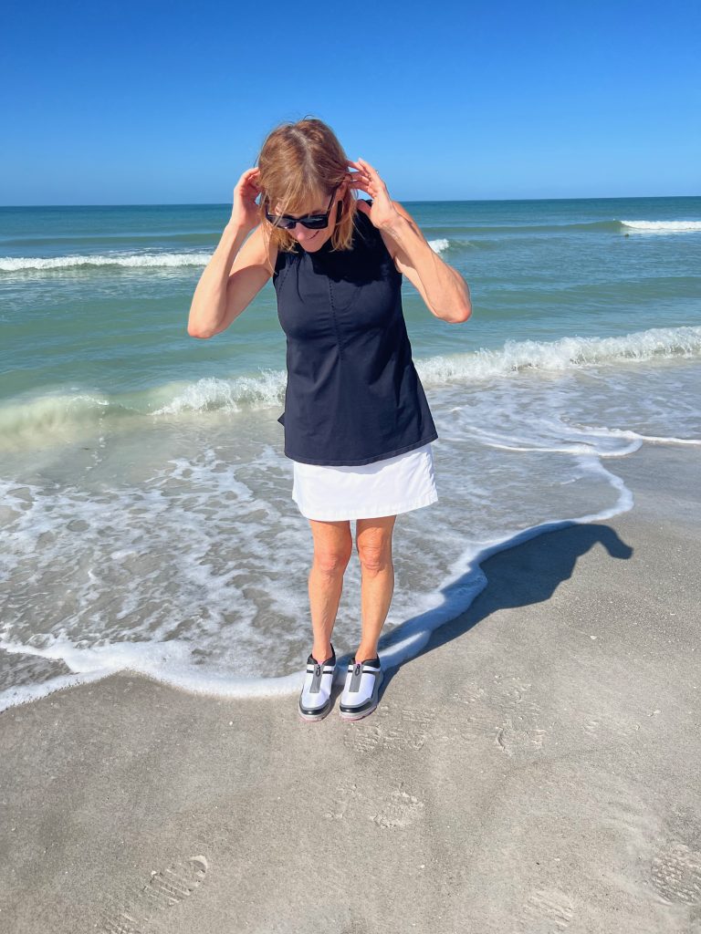 woman standing at the shore