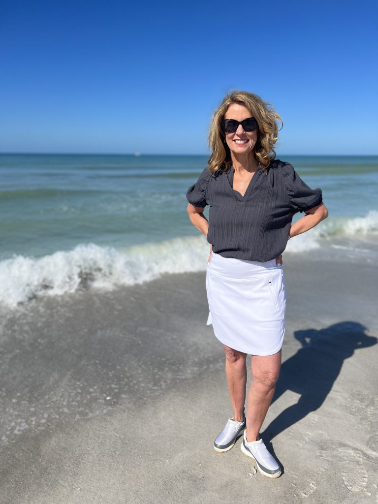 woman standing by the shore